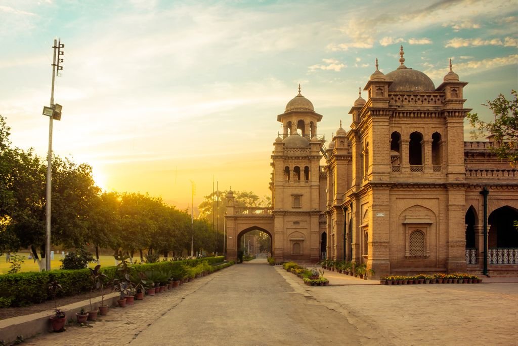 Beautiful view of Peshawar Mosque during sunset, showcasing historic architecture and a serene environment.